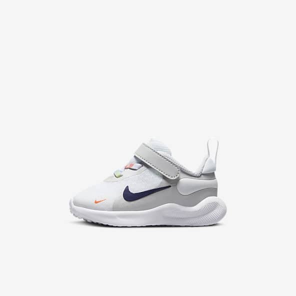 Nike velcro junior trainers best sale